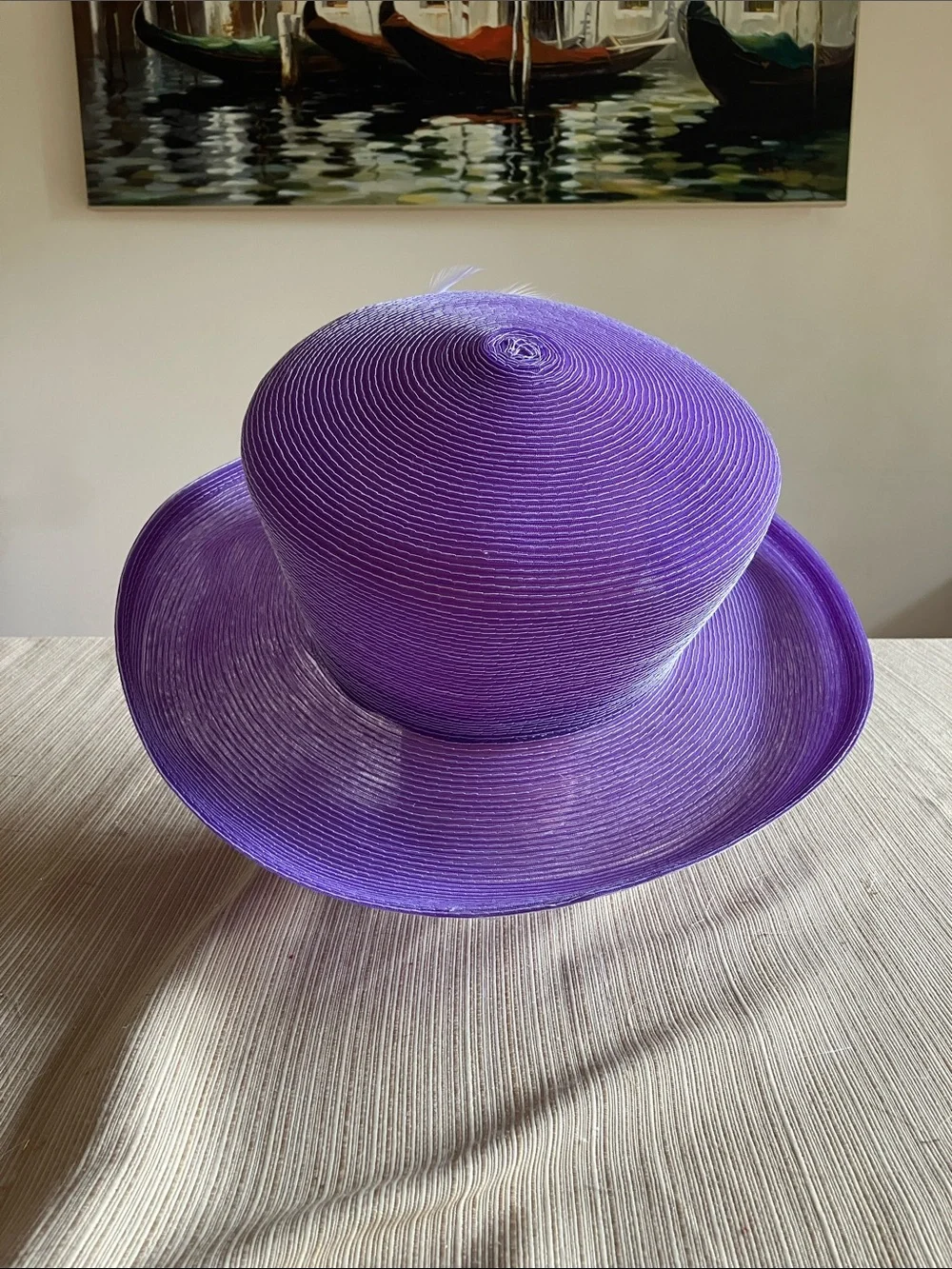 Elegant Purple Wide-Brim Floral Hat With White Feather Accents